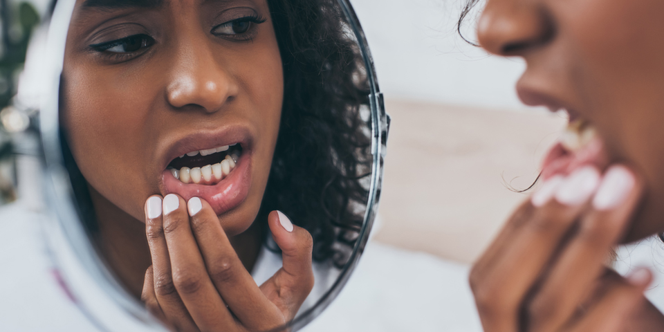 What are the possible causes of a slight tooth pain?